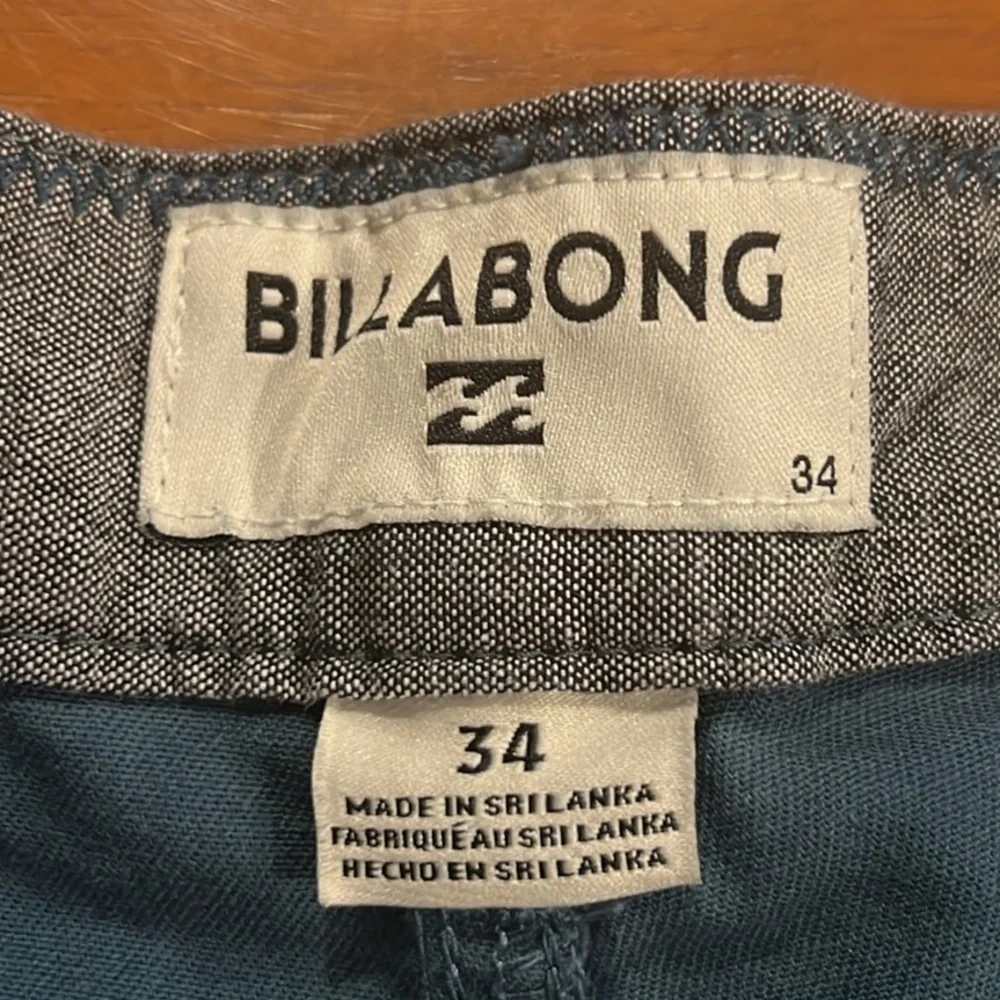 Billabong men’s teal billabong 9.5” shorts size 34
